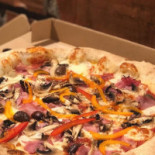 Tudi's Pizza Mâncare