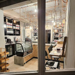 Adam's Coffee Wine And More În interior